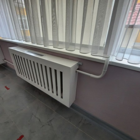 Декоративный экран для радиаторов детского сада 